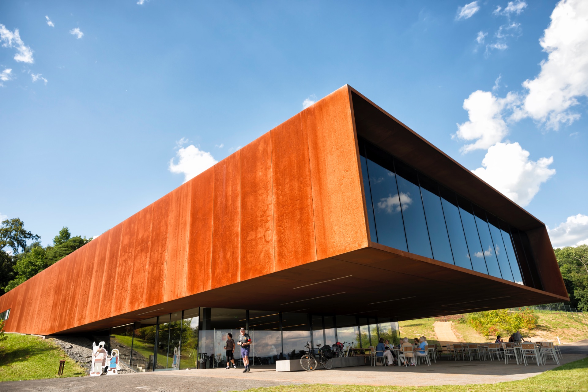 The museum and research center of the Celtic culture. The museum was opened in 2011 by the Hessen office of built heritage conservation ( Landesamt fȕr Denkmalpflege Hessen). It is located at the important place of discovery of a Celtic settlement aged about 5 thousend B.C. In the front of the building you see visitors watching and enjoing at the location.